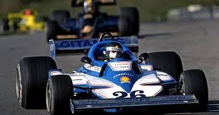 Jacques Laffite Of France Drives The Ligier Js5 02 Matra Ahead Of Gunnar Nilsson Of Sweden In The Lotus 77 R2 Ford Cosworth Dfv And Matra Race Cars Sport Cars