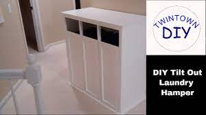 Or you are tired of carrying clothes around the house with your hand? Diy Tilt Out Laundry Hamper Cabinet Youtube