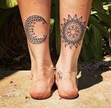 Female Sun And Moon Tattoos Behind Leg Leg Tattoos Women Sun Tattoos Leg Tattoos