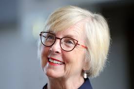 Who is Becky Edwards? What are her positions?