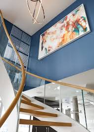 Cast Curved Staircase Stars In Nyc Condo Designed By Cortina Kall Condo Design Curved Staircase Nyc Condo