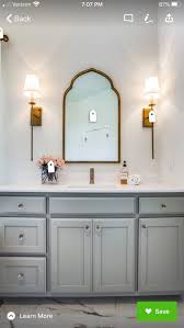 It's not a perfect match, it is a bit brighter, but it's not outrageous either. Pulls Mirror And Lighting To Match Delta Champagne Bronze Bathroom