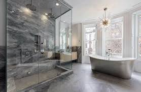 Contemporary Bathroom With Infinity Shower Drain And Freestanding Tub With Chandelier Contemporary Master Bathroom Luxury Bathtub Bathroom Design
