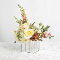 What is the cube vase? Mirrored Vases Wayfair