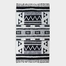 Black And White Tribal Rug Runner A Bold Geometric Pattern Inspired By Traditional Moroccan Kilim Design Graces Our Handwoven 5x8 Wool Rug In Graphic B Geometric Kilim Area Rugs Moroccan Kilim