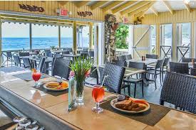 Enjoy Breakfast Lunch Or Dinner On The Water At Sebastian S Seaside Grille Indoor Dining Grilles Seaside