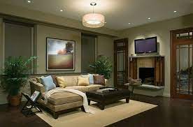 Here S How To Brighten Up Your Living Room Living Room Lighting Chandelier In Living Room Living Room Green