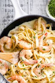 Sprinkle parmesan cheese and parsley over each plate. Ultimate Shrimp Alfredo Recipe Erren S Kitchen