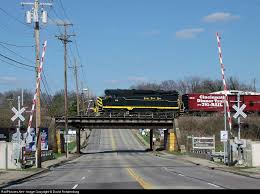 If the train is traveling 50 to 60 mph, it takes about a minute to clear a crossing. No That S Not A Pair Of Railroad Crossing Gates In The Foreground Rather It S A Unique Way To Block Off The Street If There Train Museum Dinner Train Train