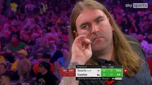 A 100 checkout saw Ryan Searle prevail in the opening leg against Adam  Gawlas in round two at the World Darts Championship.