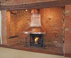 This Bespoke Thermovent Open Fire Featured A Beautiful Large Hand Beaten Copper Canopy Including Swage Line Panels To Inglenook Fireplace Inglenook Log Burner An ethanol fireplace in casing with front fire view provides elegance and warmth to spaces of all kinds.