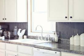 Pecky cypress, seen here on the island and hood. 55 Cool Corrugated Ideas Corrugated Metal Corrugated House Design