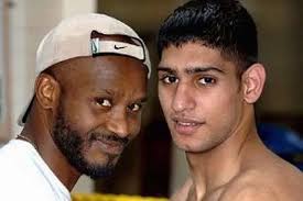 Oliver: 'Part of me is glad Khan lost'