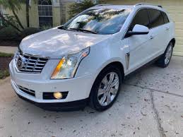 Image result for Glacier Blue 2013 SRX