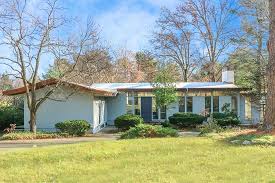 Conservatories can be attached to existing buildings or manufactured as standalone structures. On The Market A Midcentury Modern Home In Dedham With A Greenhouse