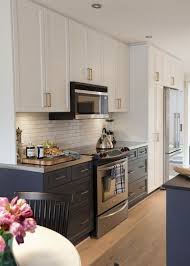 Black and blue mix together to bring a rich dark although it's expected of white kitchen cabinets to decline in popularity, they still hold well. Dual Kitchen Cabinets White On Top Gray On Bottom Kitchen Remodel Small Kitchen Layout Kitchen Renovation