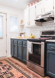 The House That Lars Built Brightens Up A Dark Kitchen With White Wood Blinds Blinds Com Kitchen Trends Kitchen Renovation New Kitchen Cabinets
