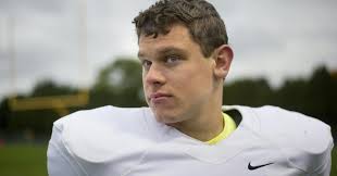 Elk River football plays for its emotional leader