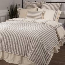 Drifting seahorses, bright corals, and seashells bathed in golden beams create an ocean botanical sanctuary in your bedroom. Market Place Gray Ticking Stripe Quilt California King Piper Classics