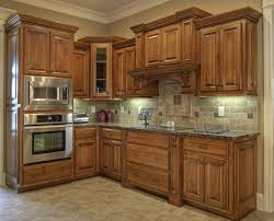 Grey Granite Countertops With Brown Cabinets Google Search French Country Kitchen Cabinets Custom Kitchen Cabinets Maple Kitchen Cabinets
