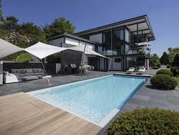 Swimmingpool.com is the world's leading resource for pool design, maintenance and outdoor living discover pool installation and repair service using our locator tool. Swimming Pools Swimming Pools Made In Germany Rivierapool Fertigschwimmbad Gmbh