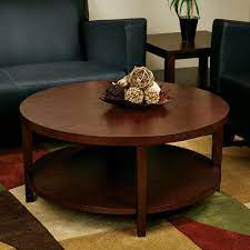 Hand crafted in mahogany the top is inlaid with different coloured mahogany wood segments arranged in a. Mahogany Round Coffee Table Round Coffee Table Coffee Table Furniture Mahogany Coffee Table