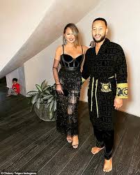 Busty ellen playing with her flute 6 min. Chrissy Teigen Glows In A Red Velvet Dress As She And John Legend Celebrate His Grammy Win At Spago Daily Mail Online