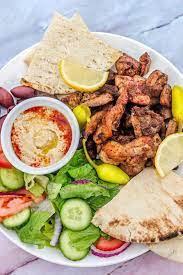 To make a wrap, get a piece of flatbread and smear with yoghurt sauce. Chicken Shawarma Plate Recipe Hilda S Kitchen Blog