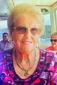 I would love it if you talented people might be able to remove the  background people from this picture. It would be very special. Thank you in  advance