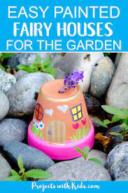 easy painted fairy houses for the garden fairy tale crafts kids fairy garden gardening for kids