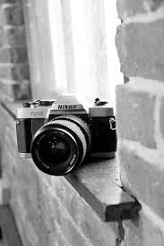 Standing Dslr Photography Tips How To Use Shoots Photographygearlearning Nikon Film Camera Photography Camera Retro Camera