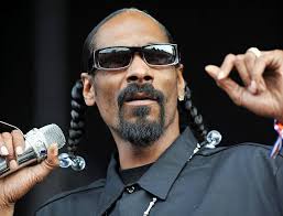 www.rnbmusicsociety.com HAPPY 53rd BIRTHDAY Snoop Dogg (Calvin Cordozar  Broadus Jr.), rapper, singer, songwriter, record producer, television  personality, entrepeneur, and actor. His music career began in 1992 when he  was discovered by Dr.