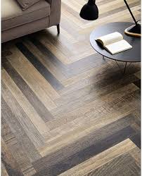 Parq Wood Effect Porcelain Stoneware Is Inspired By Old Wooden Floors With Clear Signs Of Chan Wood Floor Design Rustic Tile Floor Herringbone Wood Floor