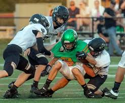 Greenup off and running: Musketeers hold off Panthers charge