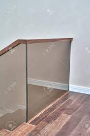 Then clean off all wood shavings. Beautiful Modern Glass Railing For Wooden Staircase With Wooden Stock Photo Picture And Royalty Free Image Image 120652516