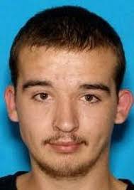 Suspect in Everett killing surrenders to police