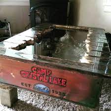 Yes, that is indeed a friday the 13th coffee table, based of course on the new blood. Friday The 13th Coffee Table Features Submerged Jason Voorhees Daily Dead