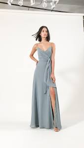 Who Doesn T Love A Good Wrap Dress The Amara Dress By Jenny Yoo 2019 Has A Sophisticated A Line Silhouette Wit Wedding Guest Dress Dresses Wedding Dress Flowy