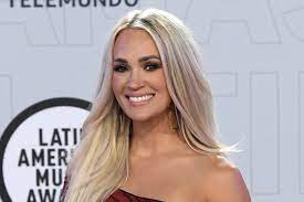 Country singer who sprang to fame as an american idol winner, then became one of country music's biggest stars. Carrie Underwood Wears Cutout Gown At Latin American Music Awards 2021 Footwear News