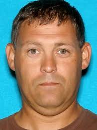 Former Hobart baseball coach accused of stealing from team surrenders to  police