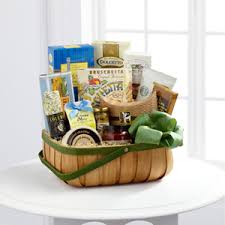 Purple stock, orange carnations, yellow gerbera daisies, purple monte casino asters and lush greens are gorgeously arranged in a whitewash woodchip basket. Dottie B S The Ftd Heartfelt Sympathies Gourmet Basket Fernandina Beach Fl 32034 Ftd Florist Flower And Gift Delivery