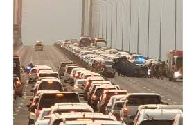 Long stretch of road with sea view. Massive Jam On Penang Bridge After Car Overturns In Accident Midspan The Star