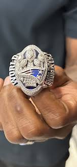 Super Bowl champ hands off football for literacy