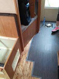 These People Replaced Their Trailer Floor With Trafficmaster Allure Plus From Home Depot They Fully Removed Remodeled Campers Camper Flooring Camper Makeover