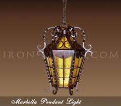 Hand forged iron three light wall sconce. Spanish Lights Best Options For You Spanish Revival Home Project Lighting