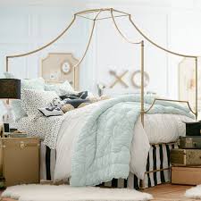 Canopy beds are such dainty and pretty additions to any you can make something very simple with a sheet of plywood for a headboard. Maison Teen Canopy Bed Pottery Barn Teen