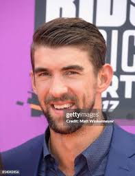 NFL player Derek Wolfe , Abigail Burrows , and a guest attend... News Photo 