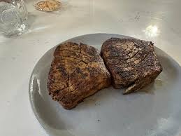 Tuna steak tonigh! It took longer to heat up the griddle than cook the  steaks! Blackened seasoning with avocado oil Asian salad with some hot  wasabi. I didn't even use the citrusy