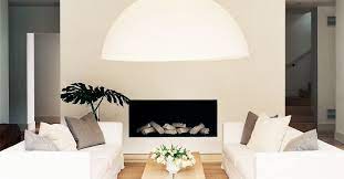 Contemporary living room design with two couches facing each other and small coffee tables between them. The Living Room And Sofa Layout That Works Every Time