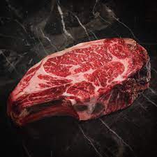 24oz Prime Dry Aged Bone In Ribeye Second City Prime Steak And Seafood